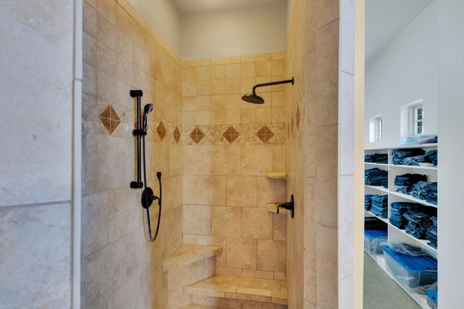 Full bathroom featuring tiled shower | Image 23