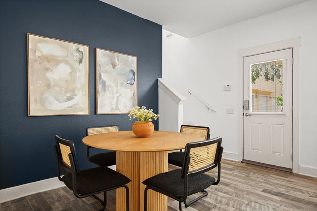 Dining room featuring wood finished floors and baseboards | Image 21
