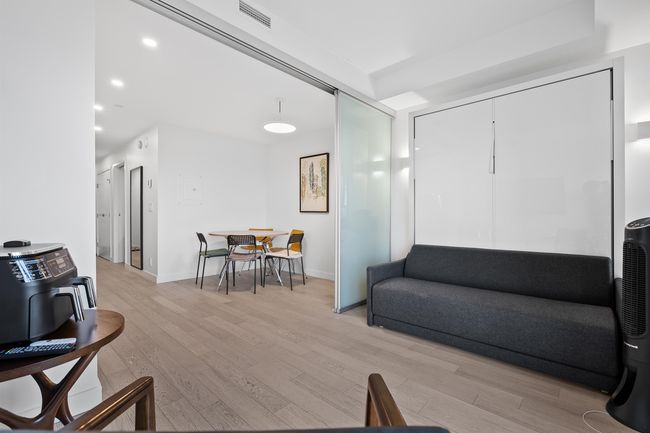 Living room featuring light wood-type flooring, recessed lighting, and baseboards | Image 5