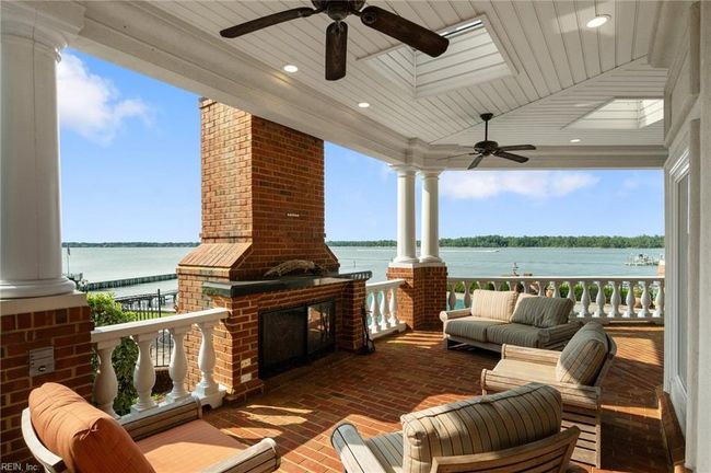 Covered Varanda with Wood-Burning Fireplace | Image 11