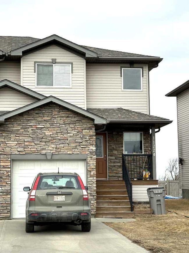11224 71 Avenue, Home with 3 bedrooms, 1 bathrooms and 2 parking in Grande Prairie AB | Image 2