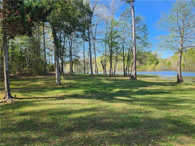 View of yard featuring a water view | Image 22