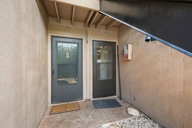 View of exterior entry featuring stucco siding | Image 28
