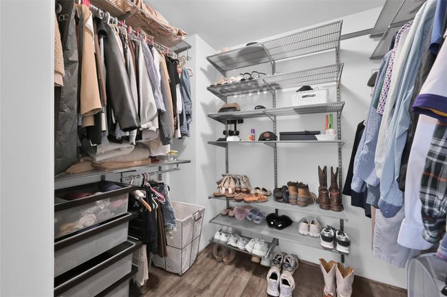 Organizing all your clothes is easy with your very own Container Store Closet System with a barn door closure. | Image 16