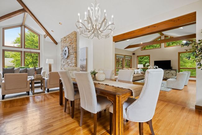 Dining Area into Living Room and Family Room | Image 13