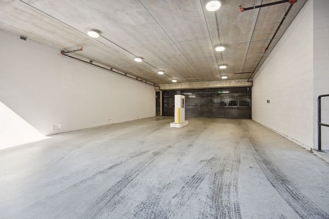 Garage with concrete block wall | Image 25
