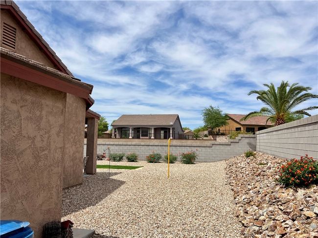 View of yard featuring fence | Image 39