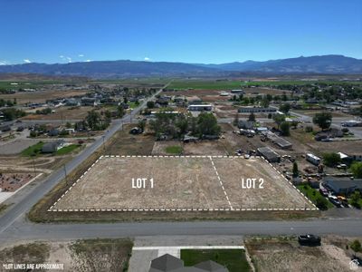 Drone / aerial view featuring a mountain view | Image 1