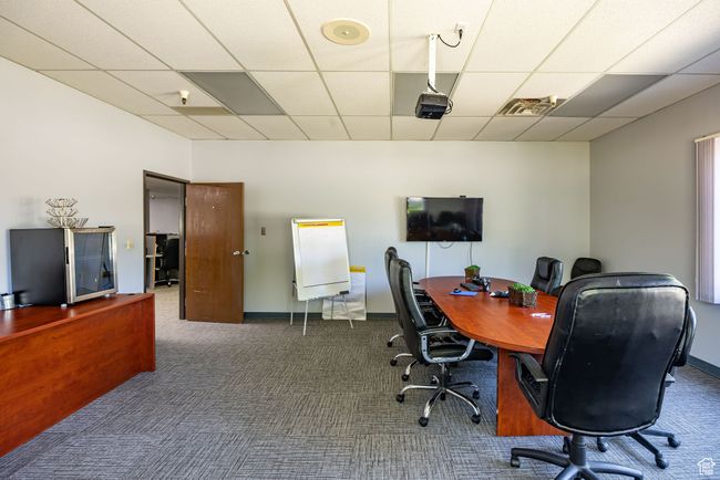 Office space featuring a paneled ceiling and carpet floors | Image 12