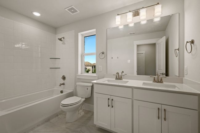 Guests will enjoy their own space in this lovely guest bath! | Image 17