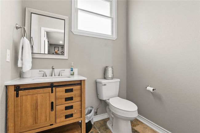 Bathroom with vanity and baseboards | Image 28