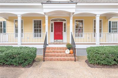 Inviting front porch welcomes you home | Image 2