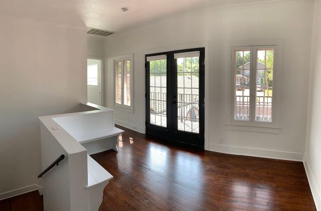 Entrance foyer featuring french doors and dark wood-style floors | Image 6