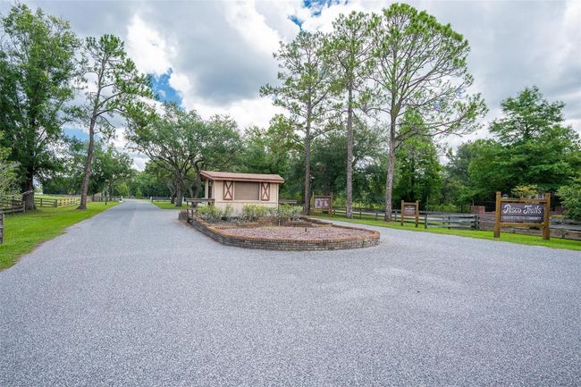 11933 Pasco Trails Blvd, House other with 4 bedrooms, 3 bathrooms and null parking in SPRING HILL FL | Image 40