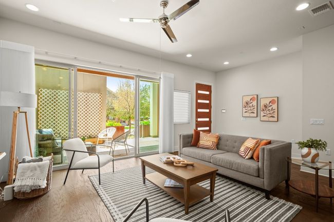 Living area with a ceiling fan, wood finished floors, and recessed lighting | Image 4
