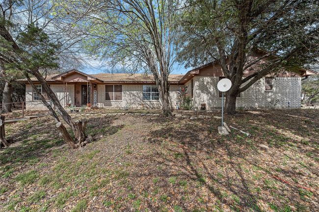 Ranch-style home featuring brick siding | Image 4