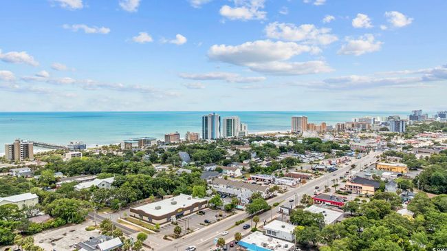 View of urban area with a nearby body of water | Image 14