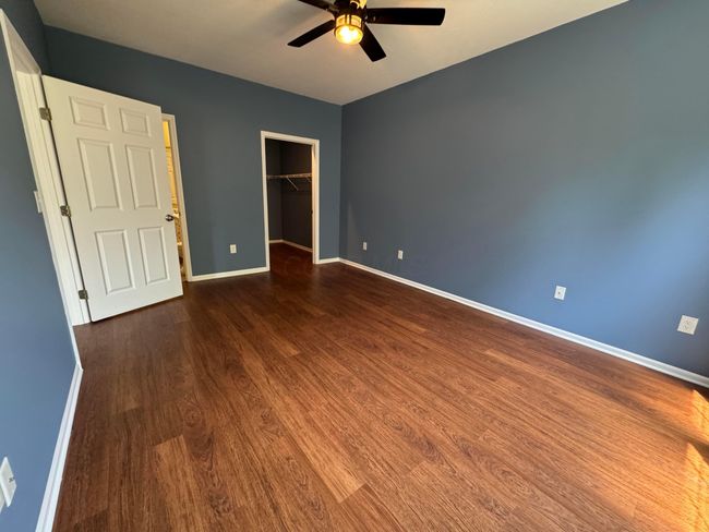 Owners bedroom - door to right is walk-in closet and door on left enters the owner bath area | Image 24