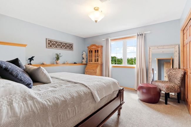 Amazingly large 3rd bedroom downstairs with scenic views to the East. | Image 49