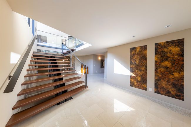 Stairway with baseboards, recessed lighting, and a skylight | Image 20
