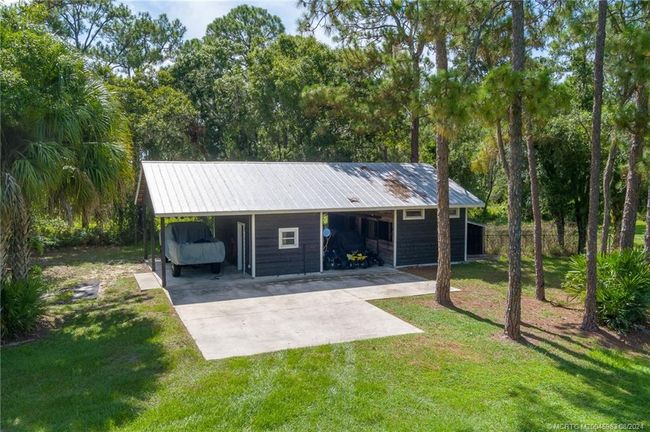 5906 Ludlum St, House other with 5 bedrooms, 5 bathrooms and 3 parking in Palm City FL | Image 20