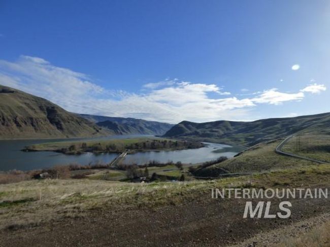Mountain view featuring a nearby body of water | Image 29