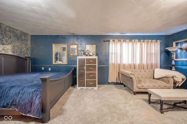 bedroom featuring carpet | Image 8