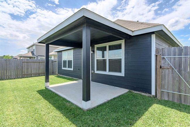 Backyard with covered patio | Image 37