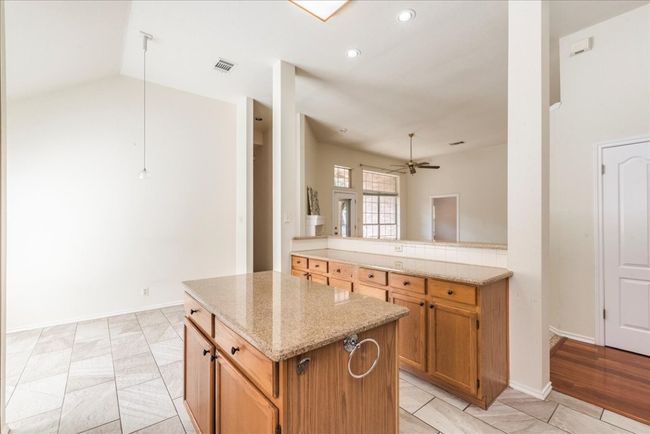 Kitchen open to family room | Image 13