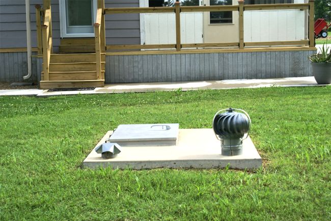Entry to storm shelter featuring a yard | Image 6