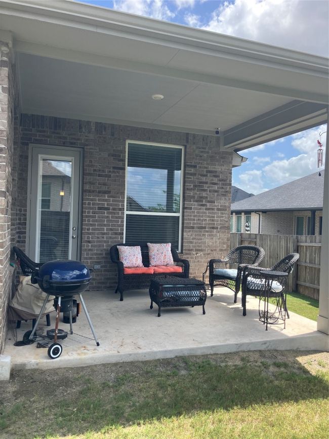 View of patio / terrace featuring an outdoor hangout area and area for grilling | Image 26