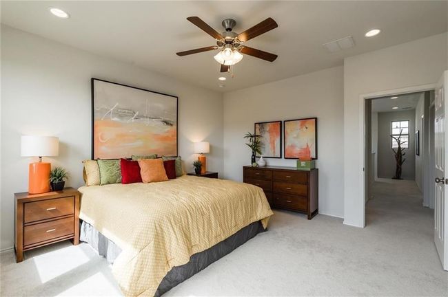 Bedroom with light colored carpet, recessed lighting, and ceiling fan | Image 18