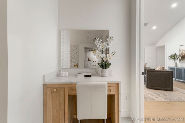 Makeup vanity in the primary bathroom | Image 48