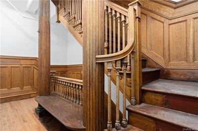 Stairway featuring wood-type flooring | Image 3