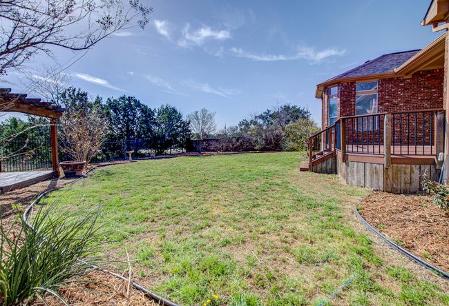 View of yard with fence | Image 33