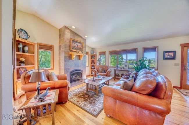 Living room with fireplace | Image 12