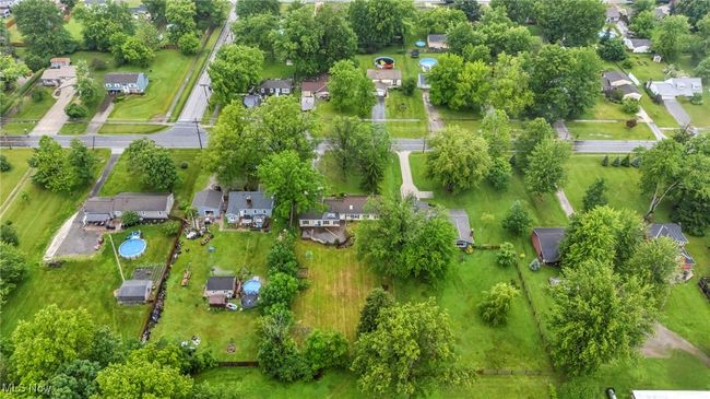 Aerial view of property's location with nearby suburban area | Image 46