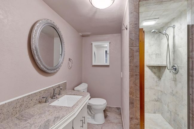 Unfurnished room featuring wood finished floors and baseboards | Image 31