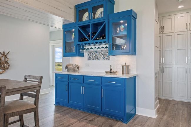 This built-in hutch has ample storage and can also be used as a bar for entertaining. | Image 18