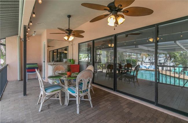 12321 Moon Shell Dr, House other with 3 bedrooms, 3 bathrooms and 2 parking in MATLACHA ISLES FL | Image 37