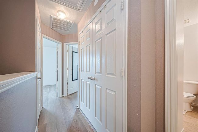 View from primary retreat to the other 2 secondary bedrooms. | Image 19