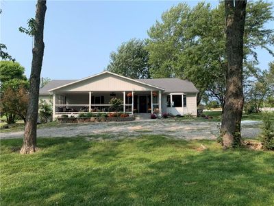 View of front of house featuring a front lawn | Image 1