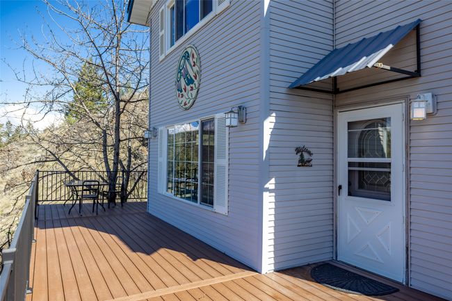 Wooden terrace with outdoor dining space | Image 86