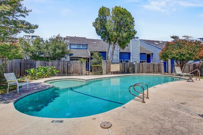 Community pool featuring a patio area | Image 20