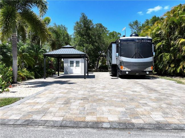 View of parking with a gazebo | Image 12