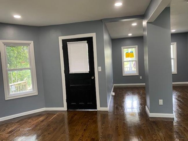 Entryway featuring wood finished floors, plenty of natural light, and recessed lighting | Image 9