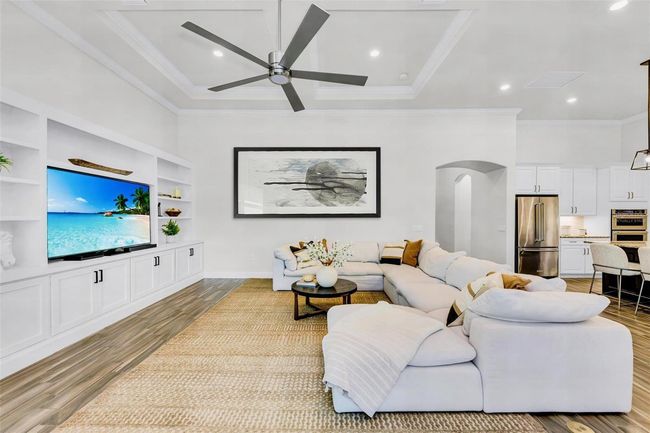 custom built-ins and High ceilings - virtually staged | Image 23