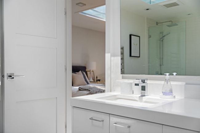 Bathroom with vanity and a stall shower | Image 19