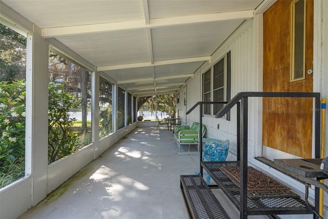 Mobile Home features a Large Screened Lanai | Image 34