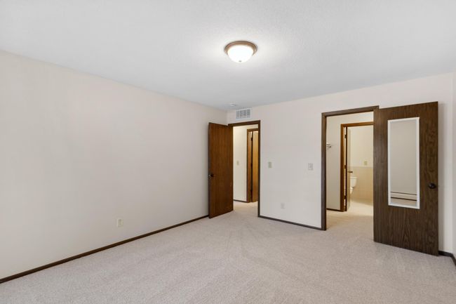 Primary Bedroom features and walk through closet & Private 3/4 bath | Image 18